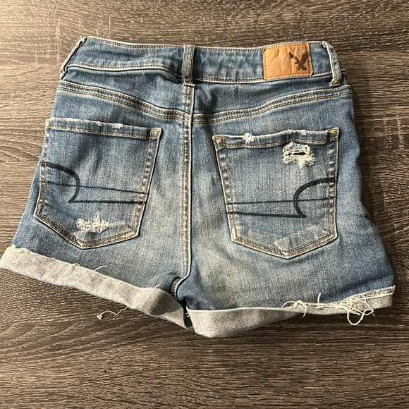 American Eagle super hi rise distressed rolled jean shorts - Picture 7 of 11